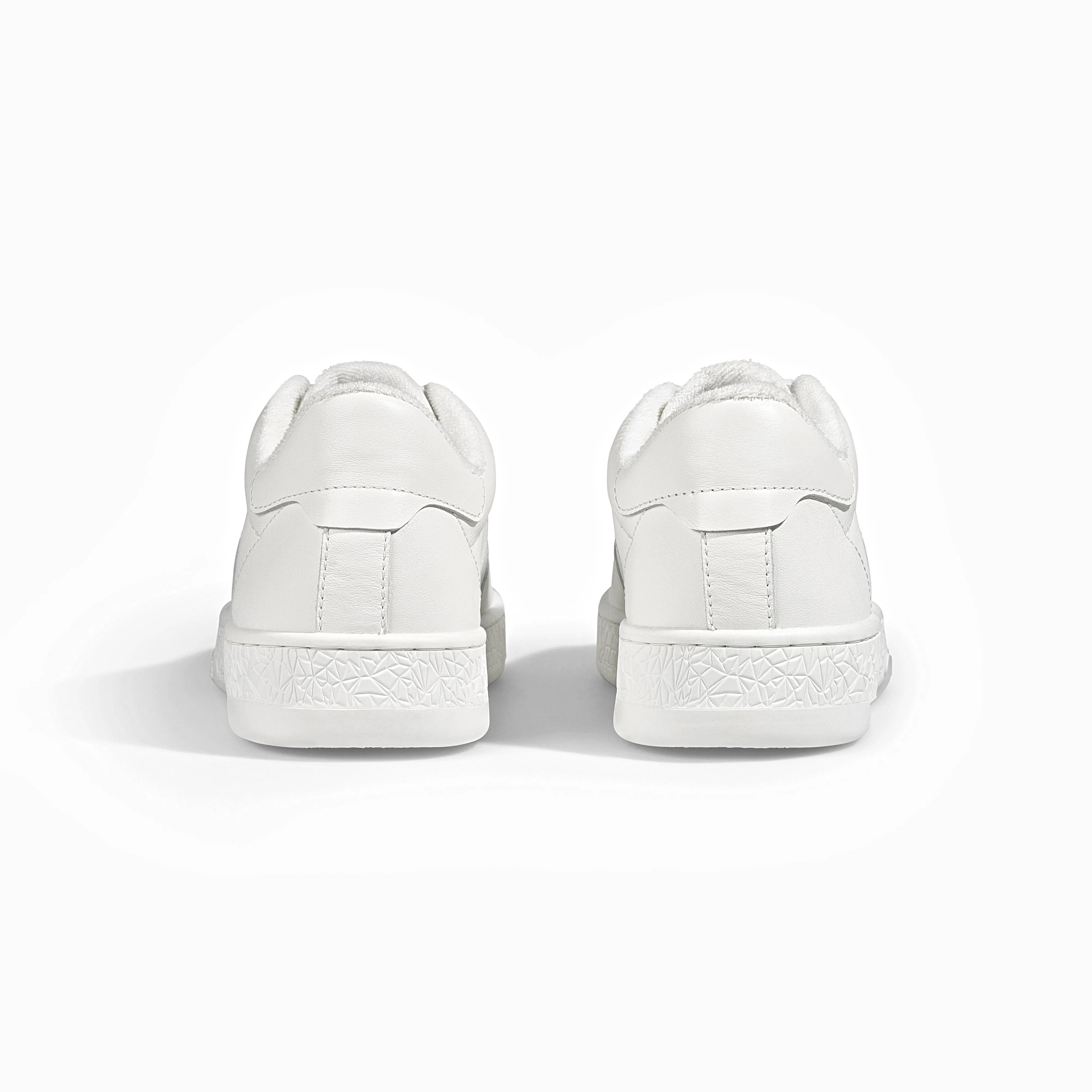 The Manifest Sneaker in White/Leather