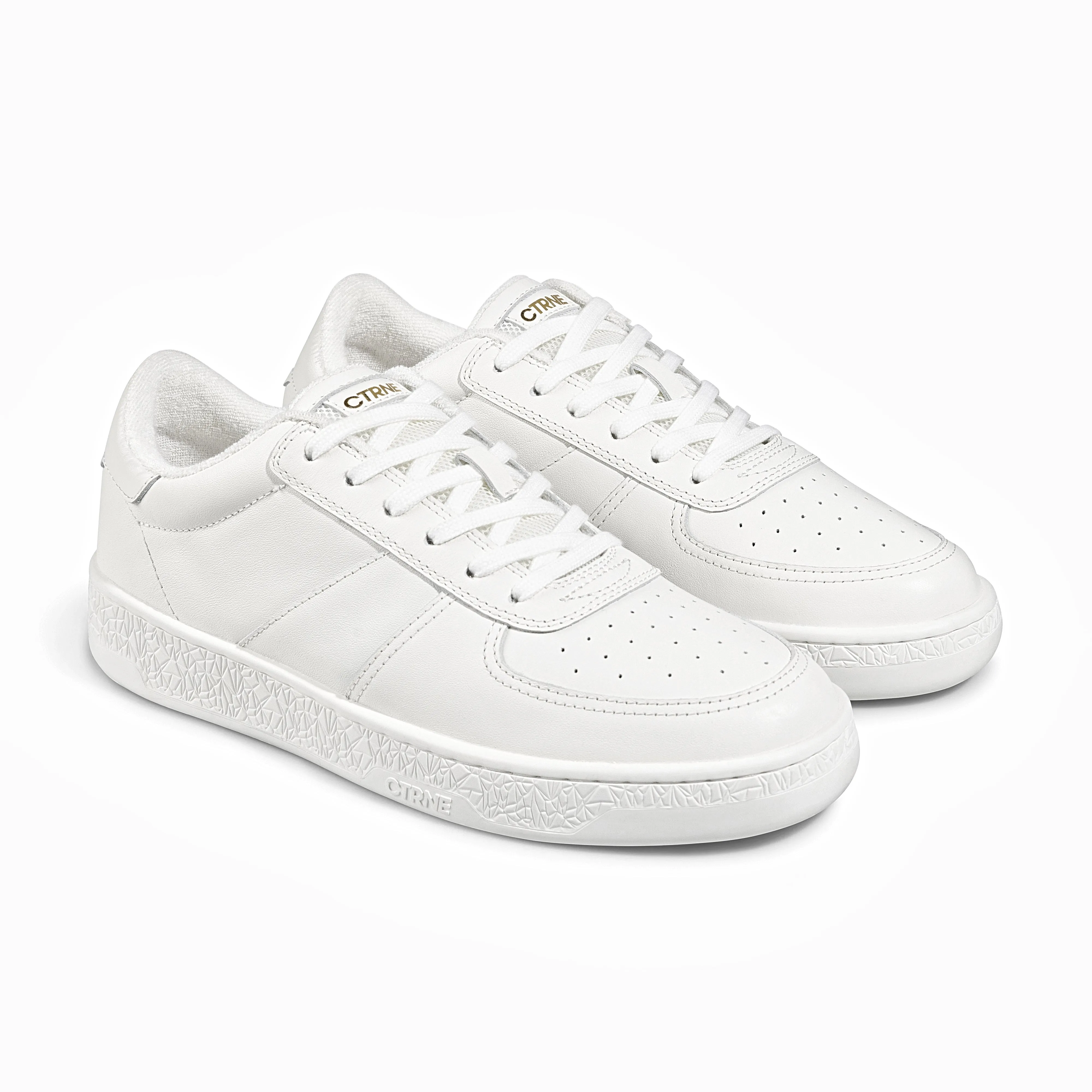The Manifest Sneaker in White/Leather
